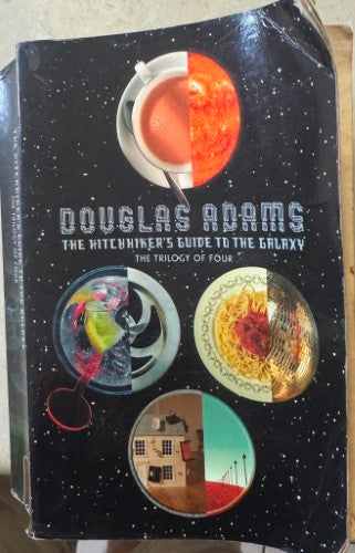 Douglas Adams - The Hitchhikers Guide To The Galaxy : The Trilogy Of Four